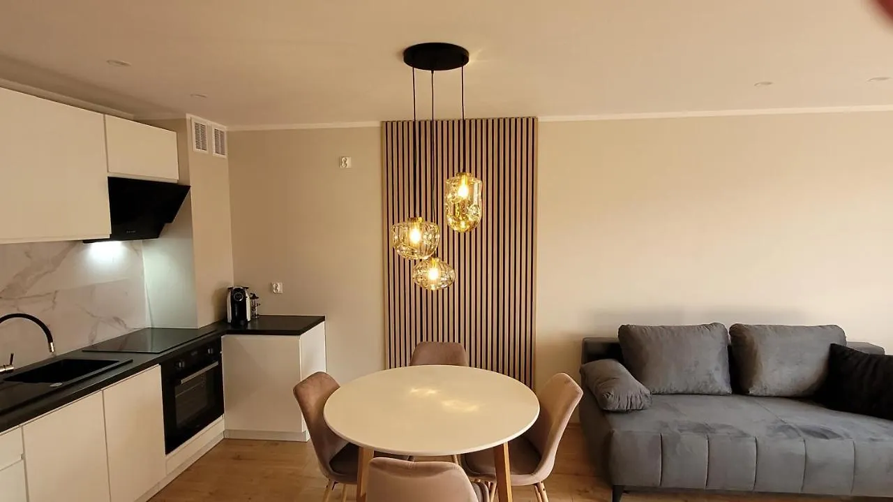 Sloneczny Apartament Z Ogrodkiem contacts
